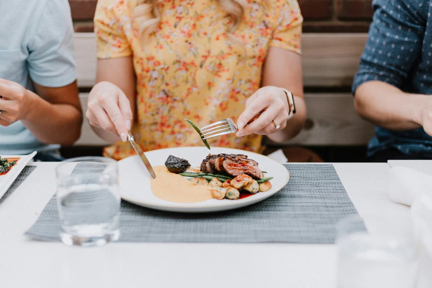 Two people sharing a table — keeping their health as one rhythm.
